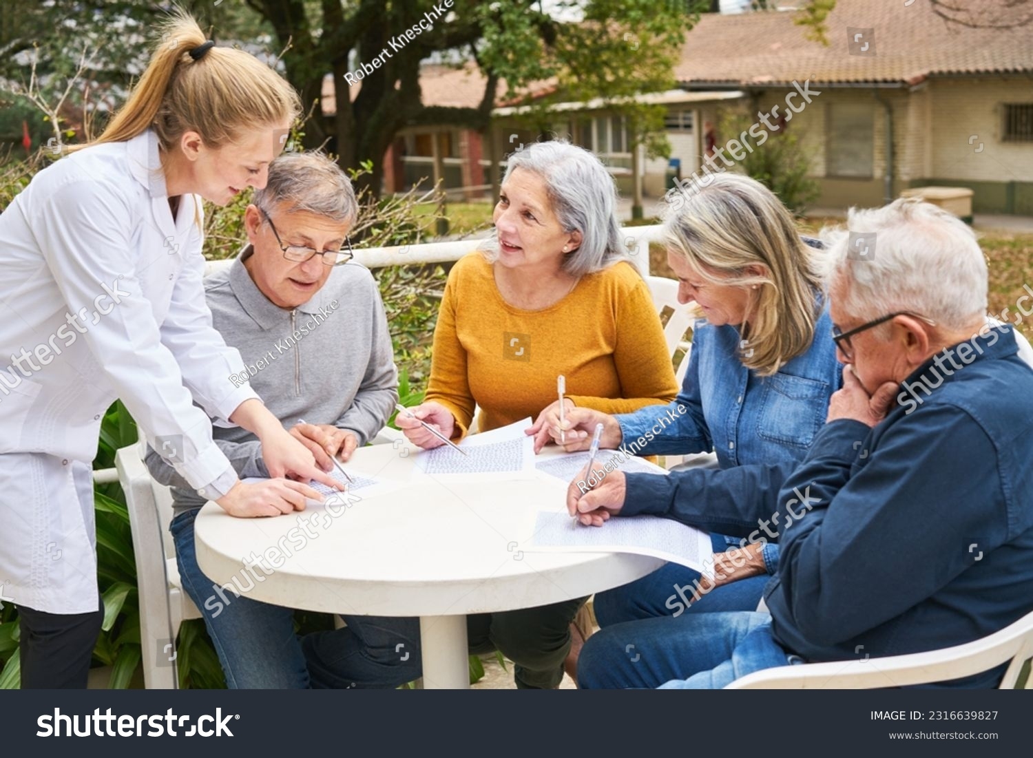 Group Senior Friends Solving Crossword Puzzle Stock Photo 2316639827 Shutterstock Group Senior Friends Solving Crossword Puzzle Stock Photo 2316639827 Shutterstock