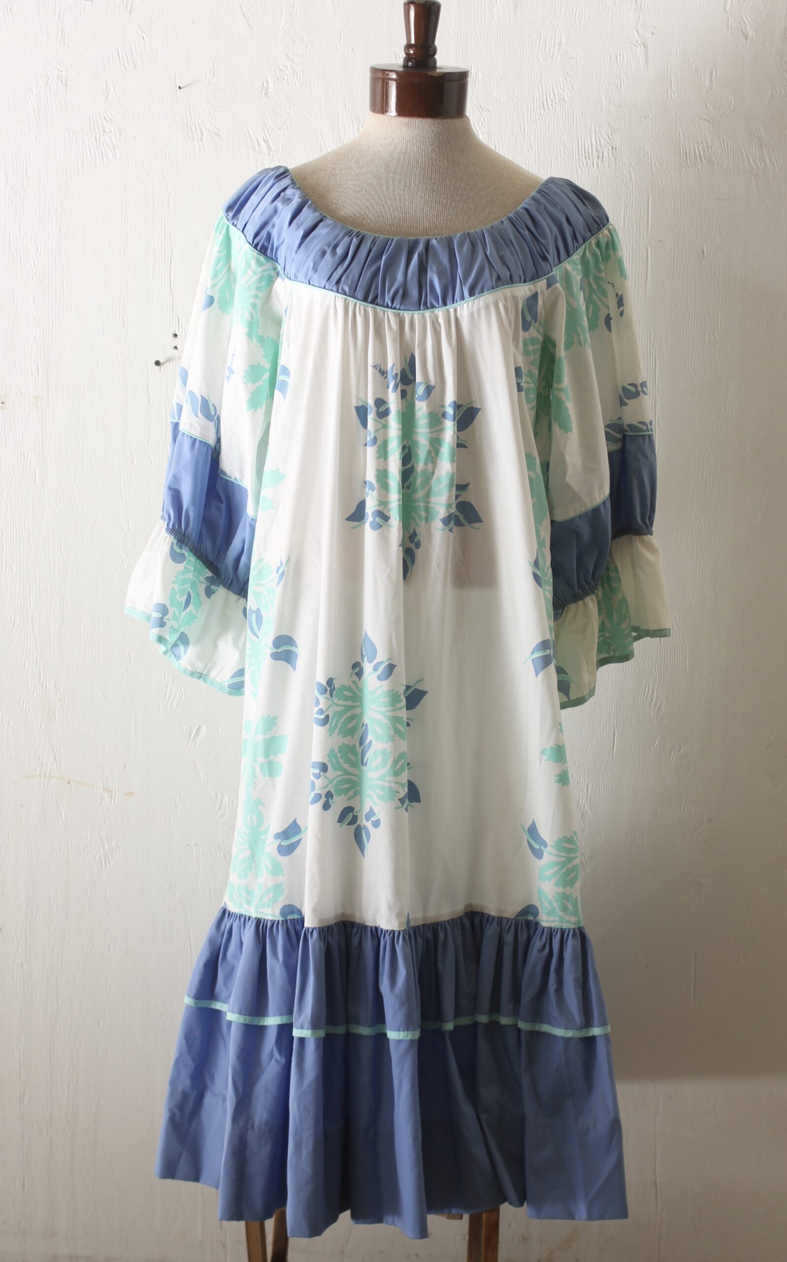 sheath or muumuu crossword clue